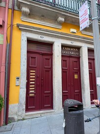 Front door, then up the stairs