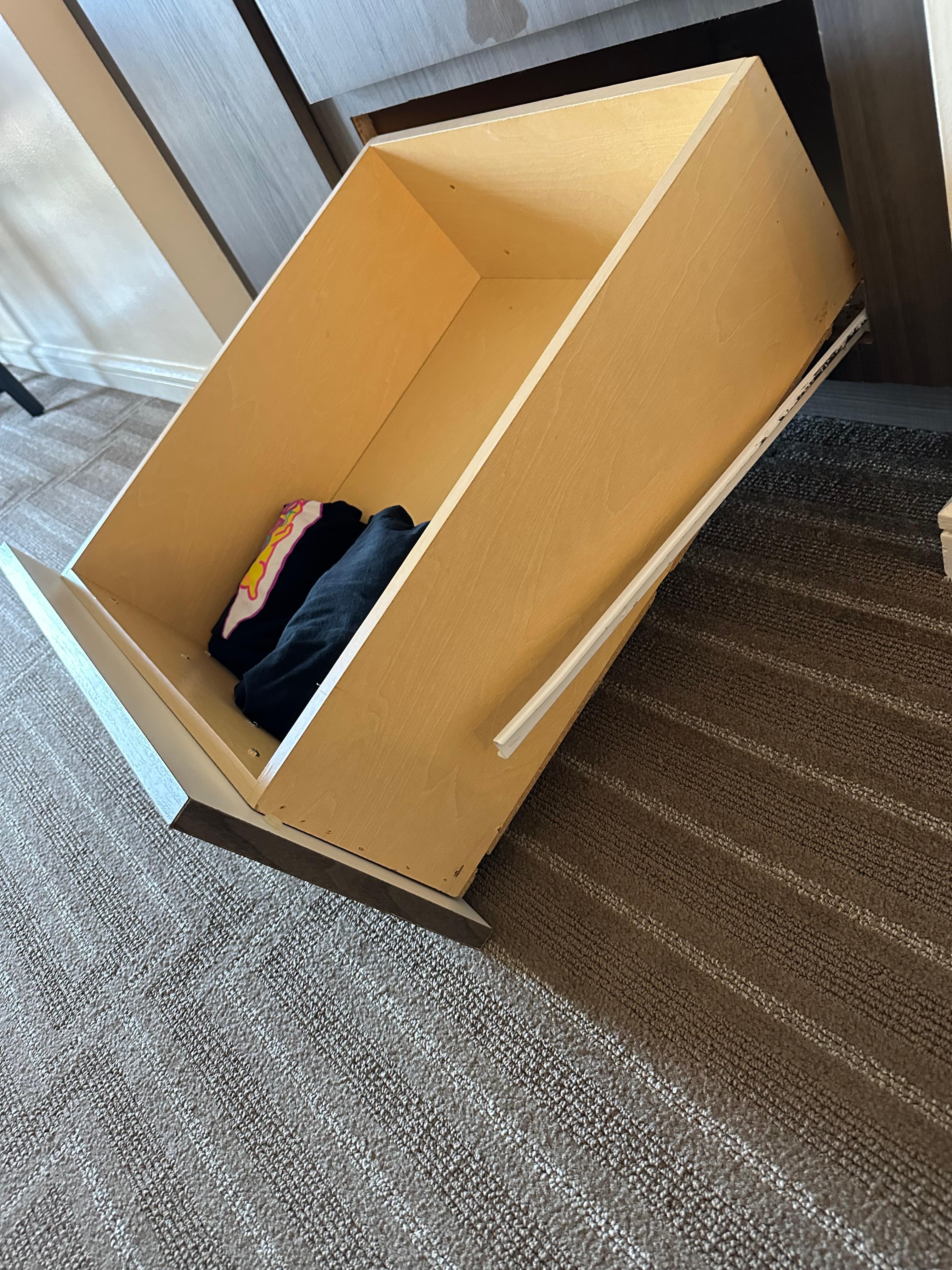 Drawer had no screws at all fell out and injured my foot.