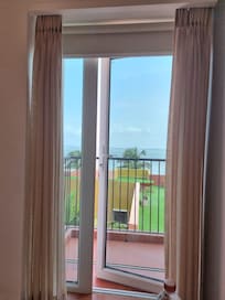 From the half open door in the balcony