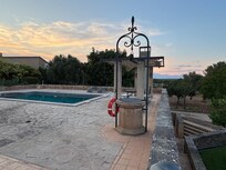 Pool and on the left owner additional house