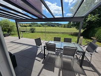 Terrasse mit Glasüberdachung