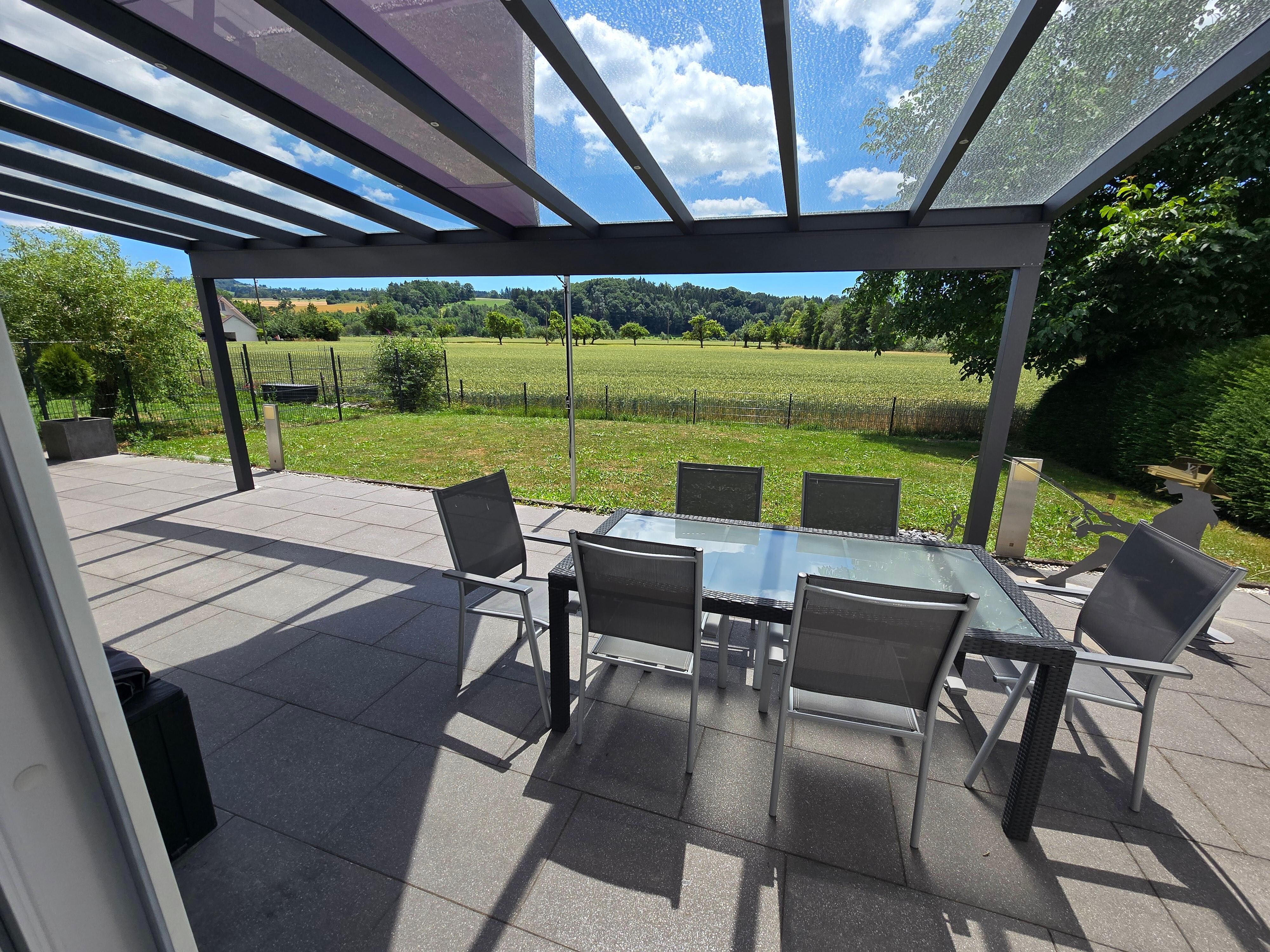 Terrasse mit Glasüberdachung