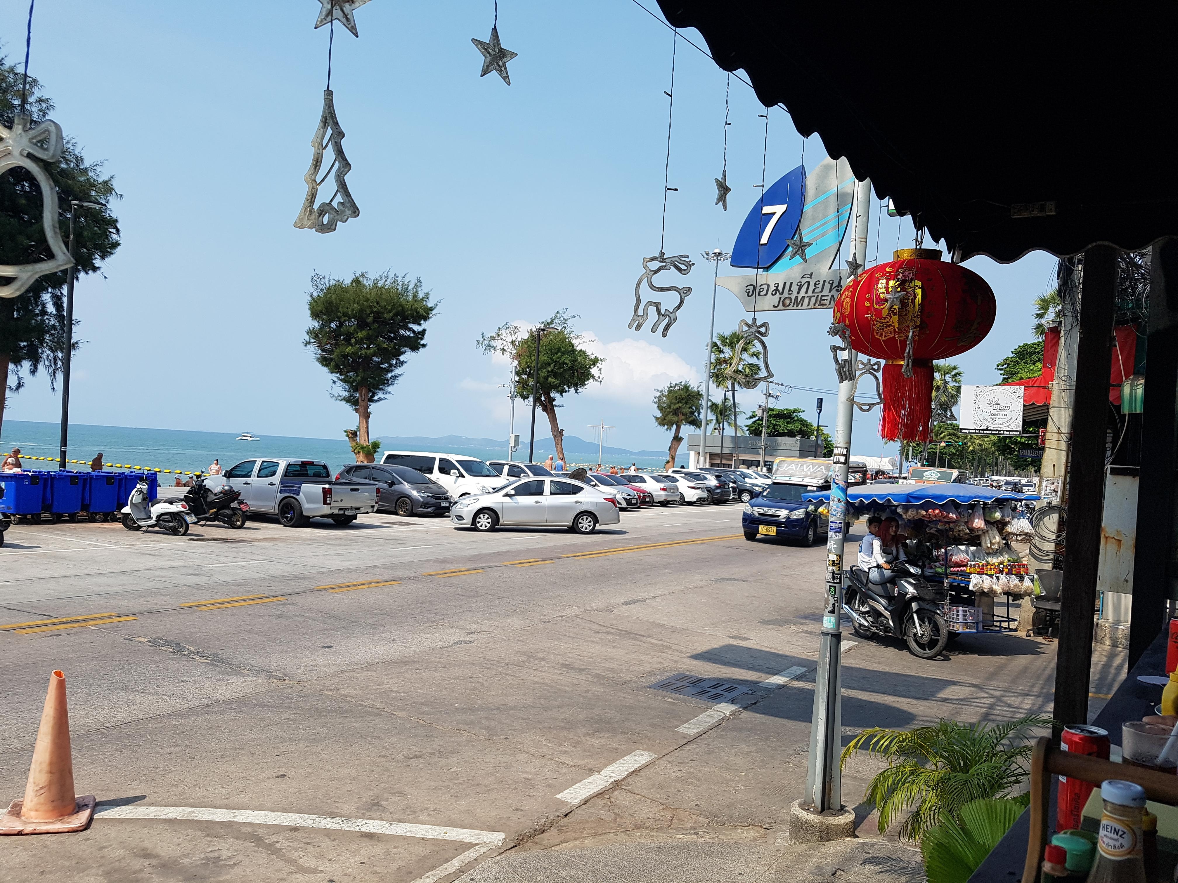 Opposite Hotel during the day. About 30 to 33 deg c. Evenings aroung 27 or 28 deg c with a breeze off the sea.