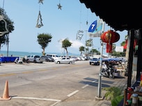 Opposite Hotel during the day. About 30 to 33 deg c. Evenings aroung 27 or 28 deg c with a breeze off the sea.