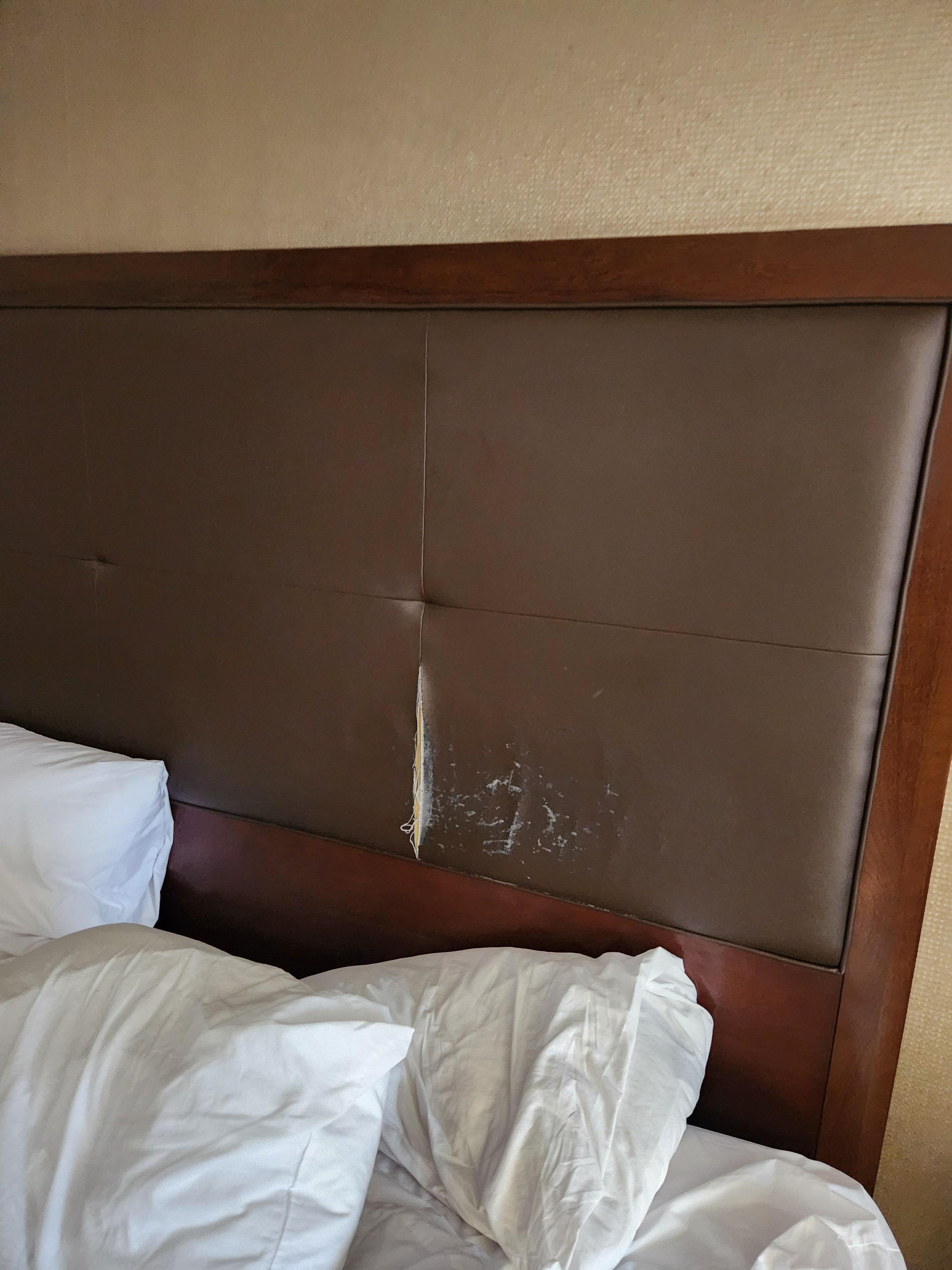 Worn amd torn headboard 