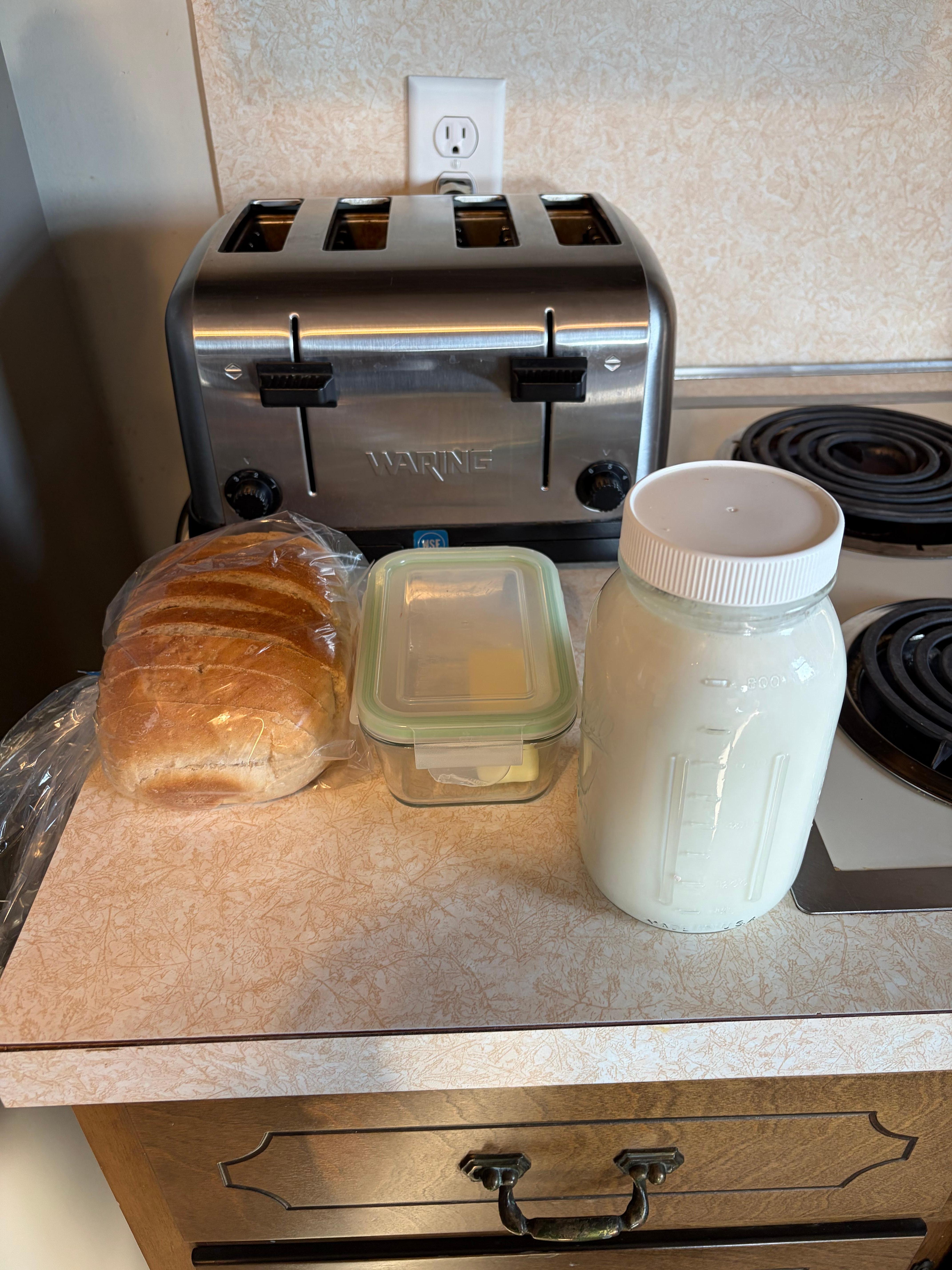 Delicious bread Wilma baked and fresh milk from their cows.