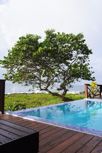Pool with lounges and ocean view