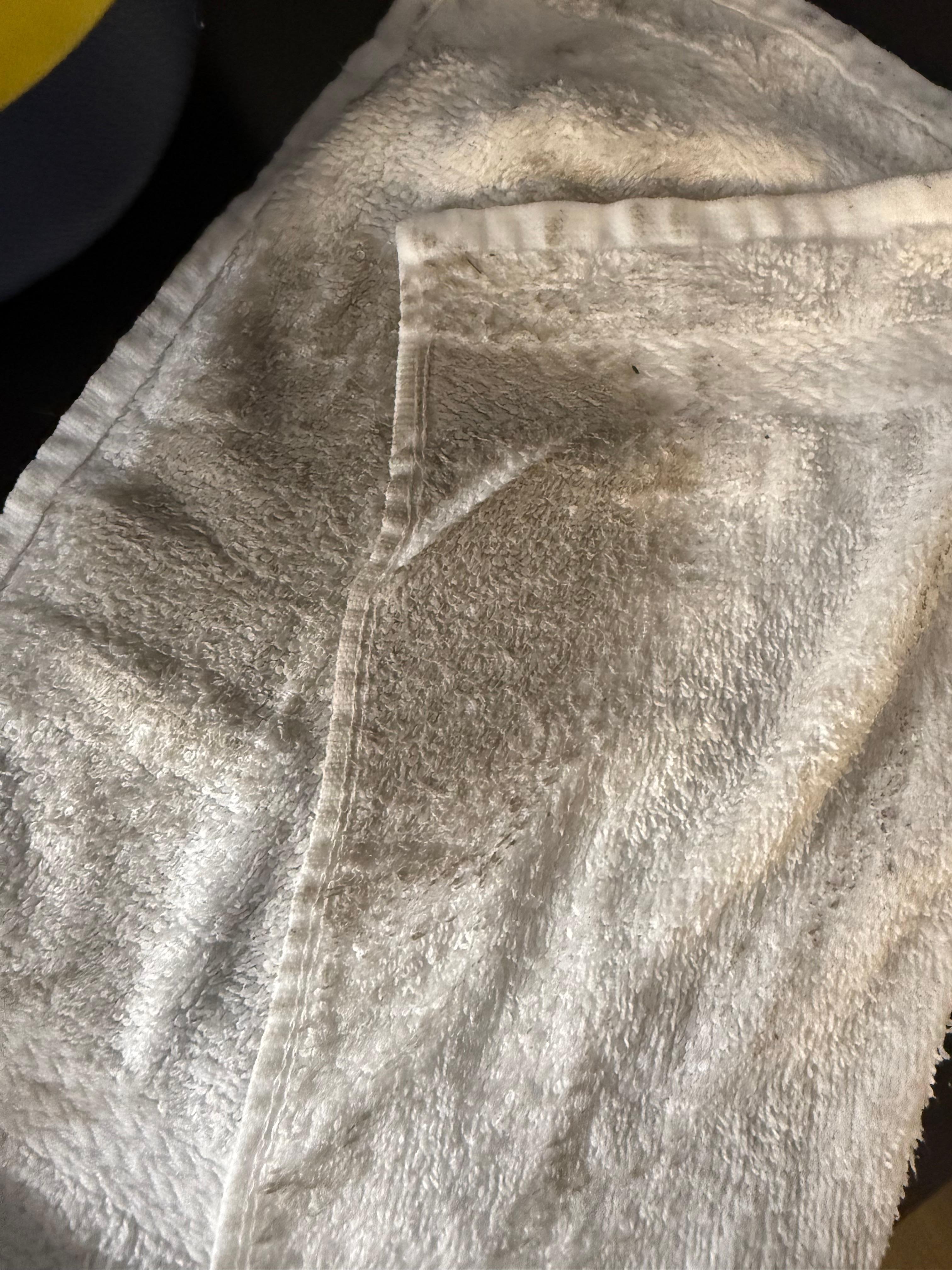 The state of the floor after a few passes with a wet washcloth.