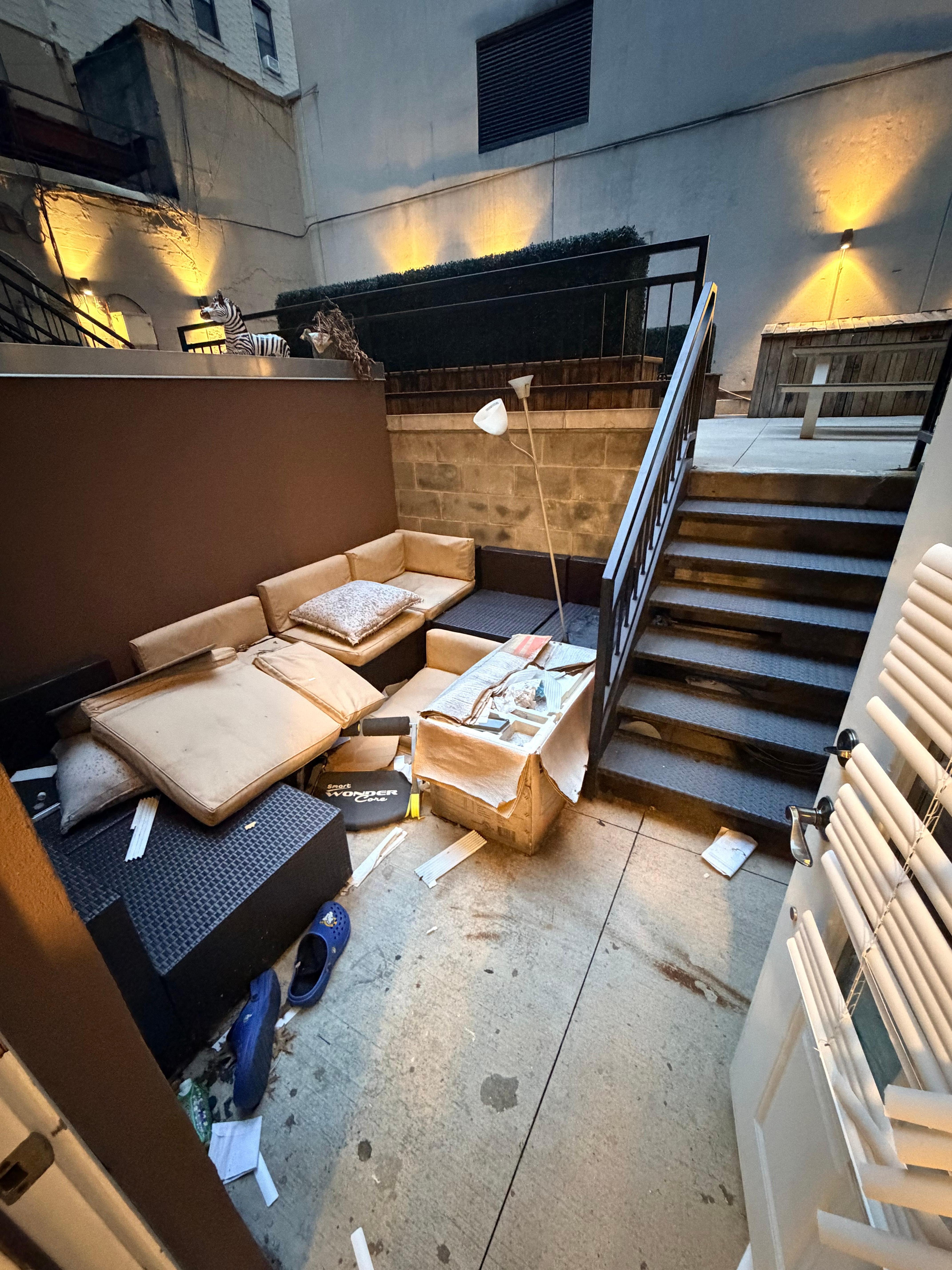 The back area when you open the back door.