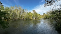 From the covered deck by the river.