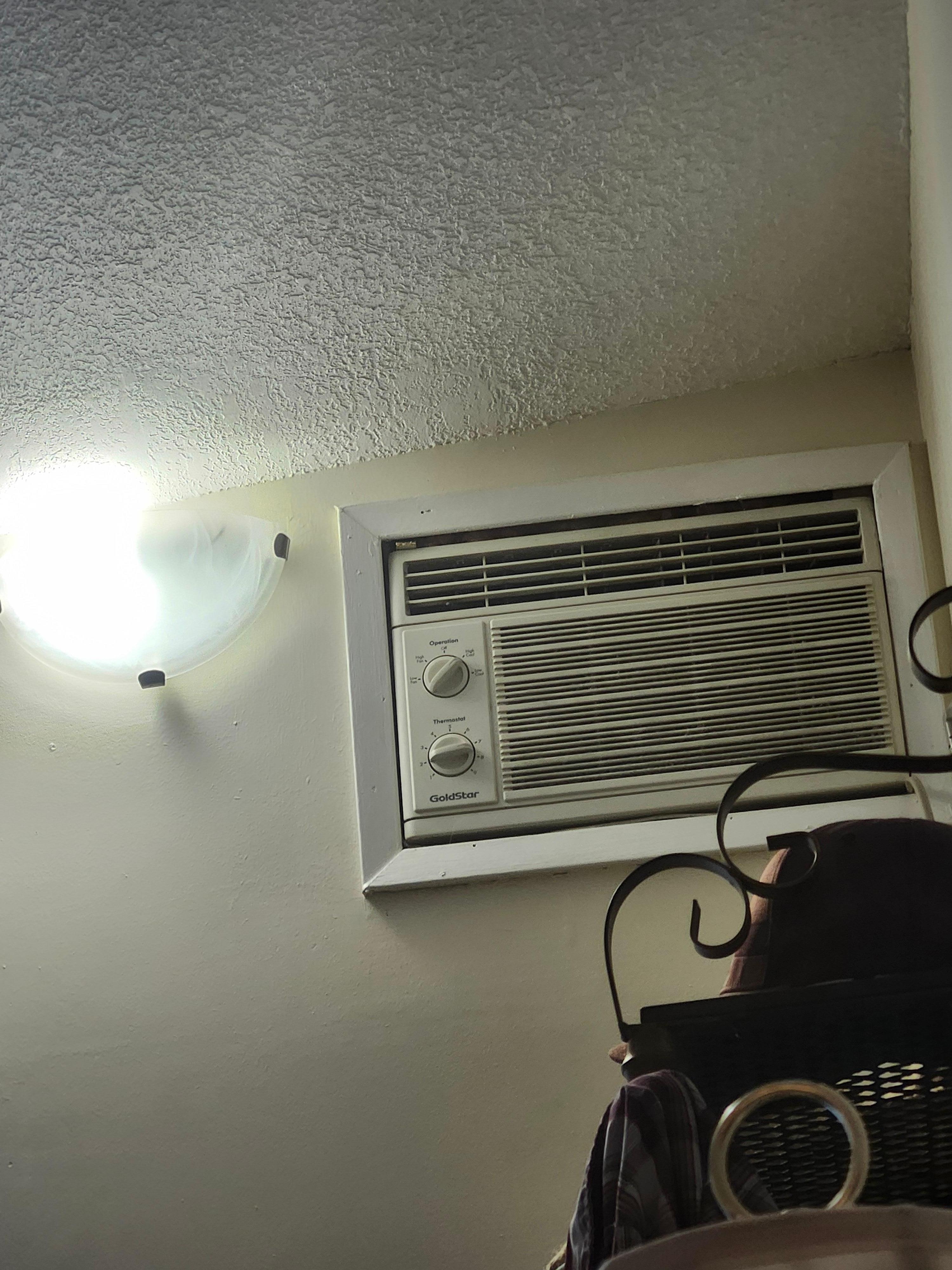 A/C at the top of the wall, hubby needed to use a chair to change the temp. Then u had to flip a switch across the room to turn on