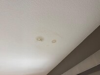 Photo of master bedroom toilet leaking drain