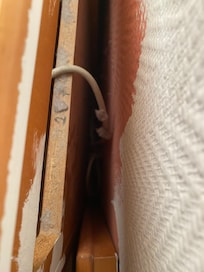 Lots of dust behind the unit were the fridge used to be. I only had a look because I needed to plug in the bedside lamp.