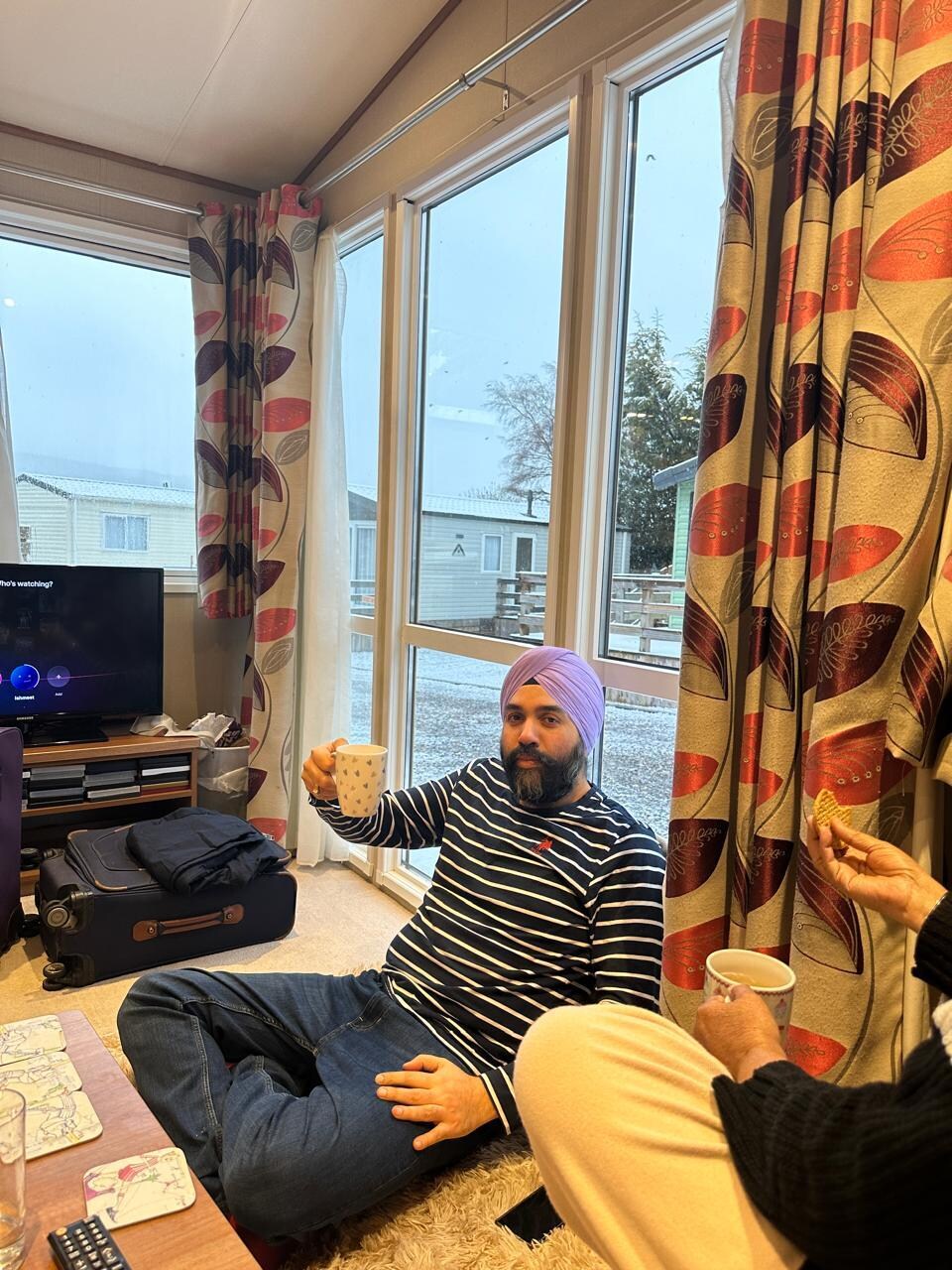 Having a nice cup of tea whilst snowing outside.