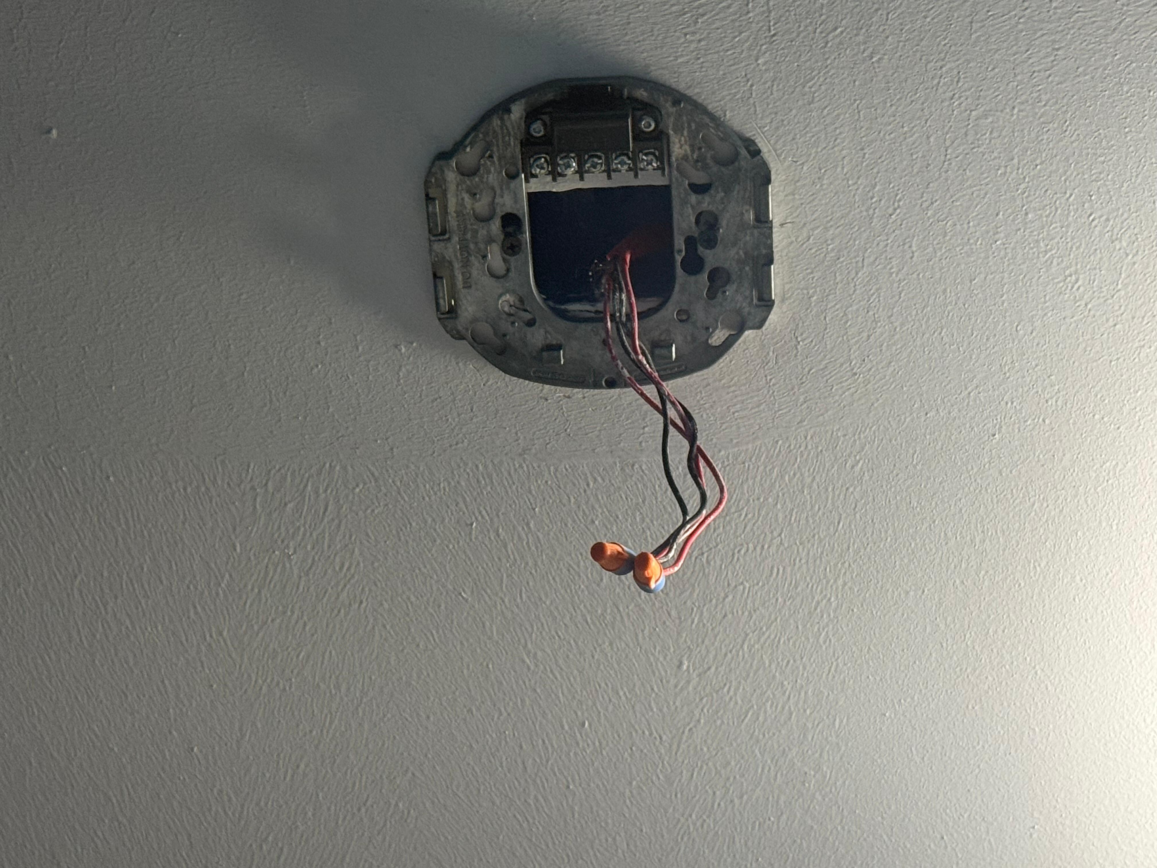 Exposed wires in the pool bathroom.