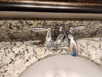 Faucet leaks all over the counter top.