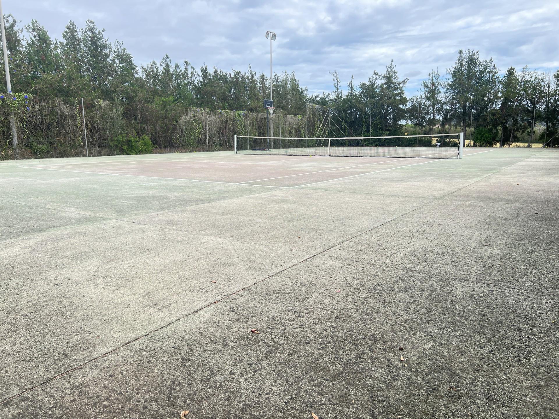 The tennis court is just abou tok but the surface is becoming loose and if it doesn't get some attention it will become unsafe. 