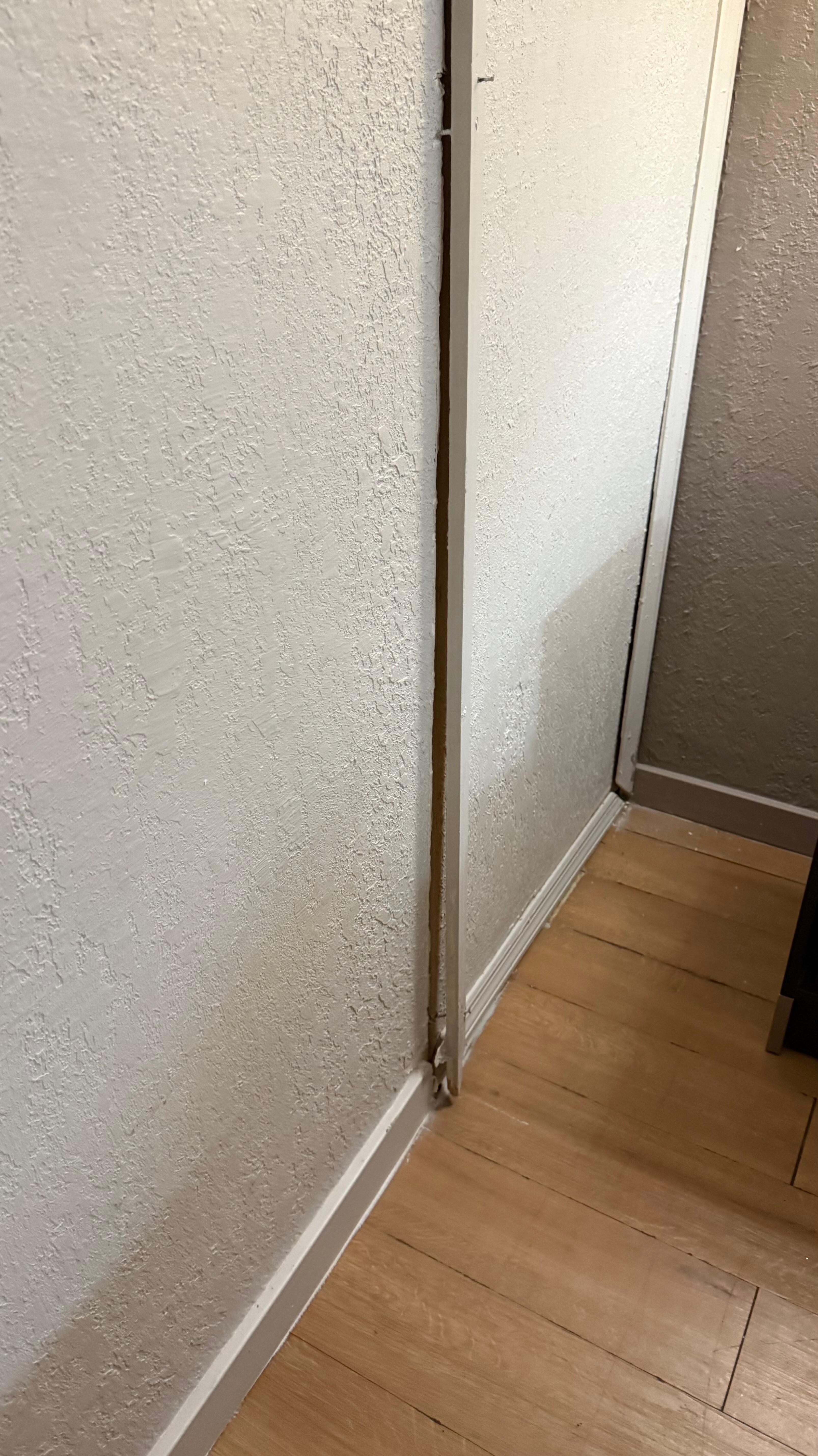This space was where the I was told the new boiler was installed. The trim was falling off of the wall. 
