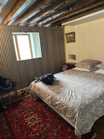 Wall partition is able to darken this bedroom #2