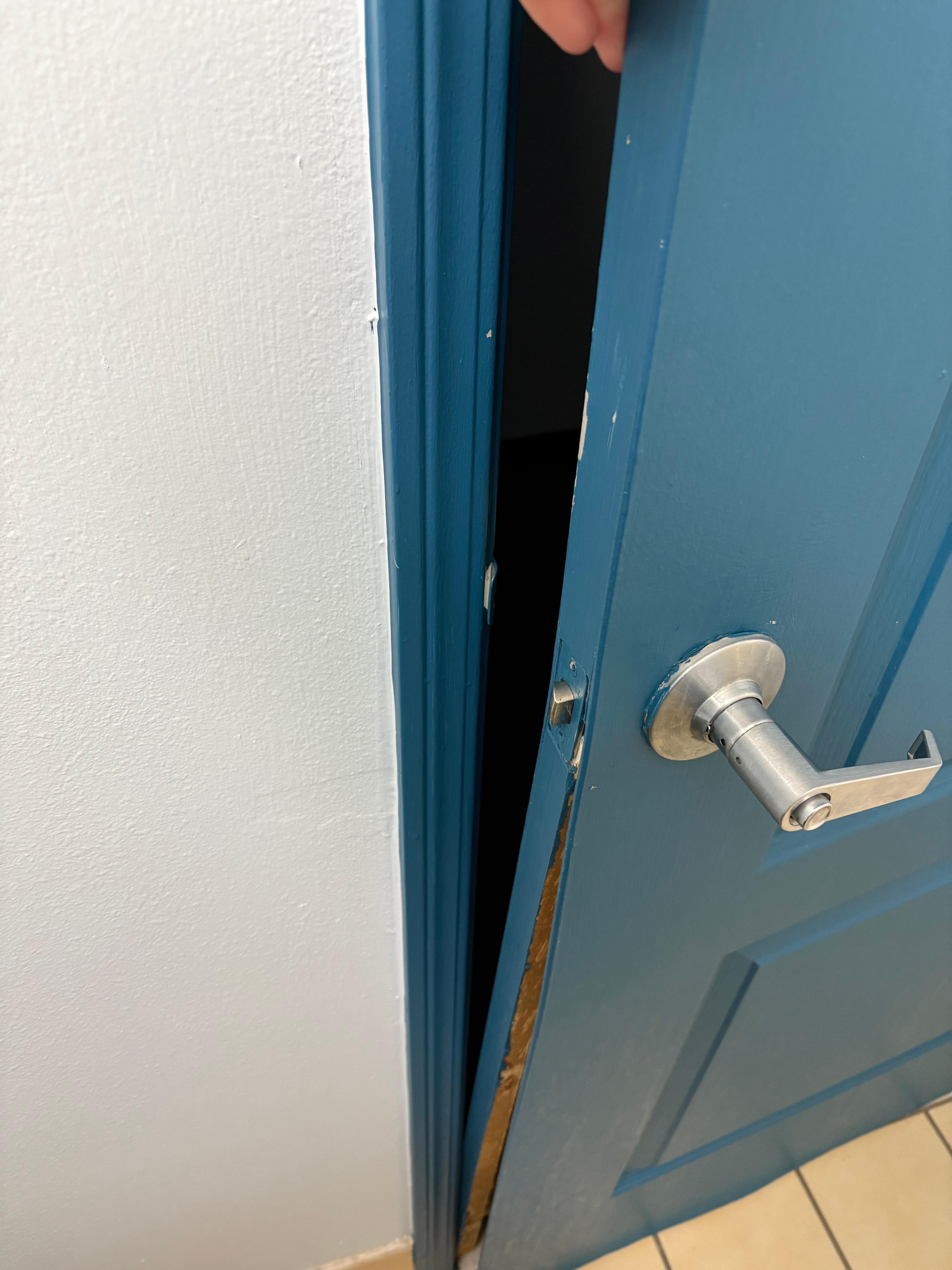 Broken bathroom door that gets stuck so you can’t open it