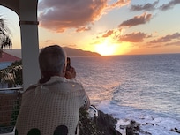 Watching the sunset from our balcony