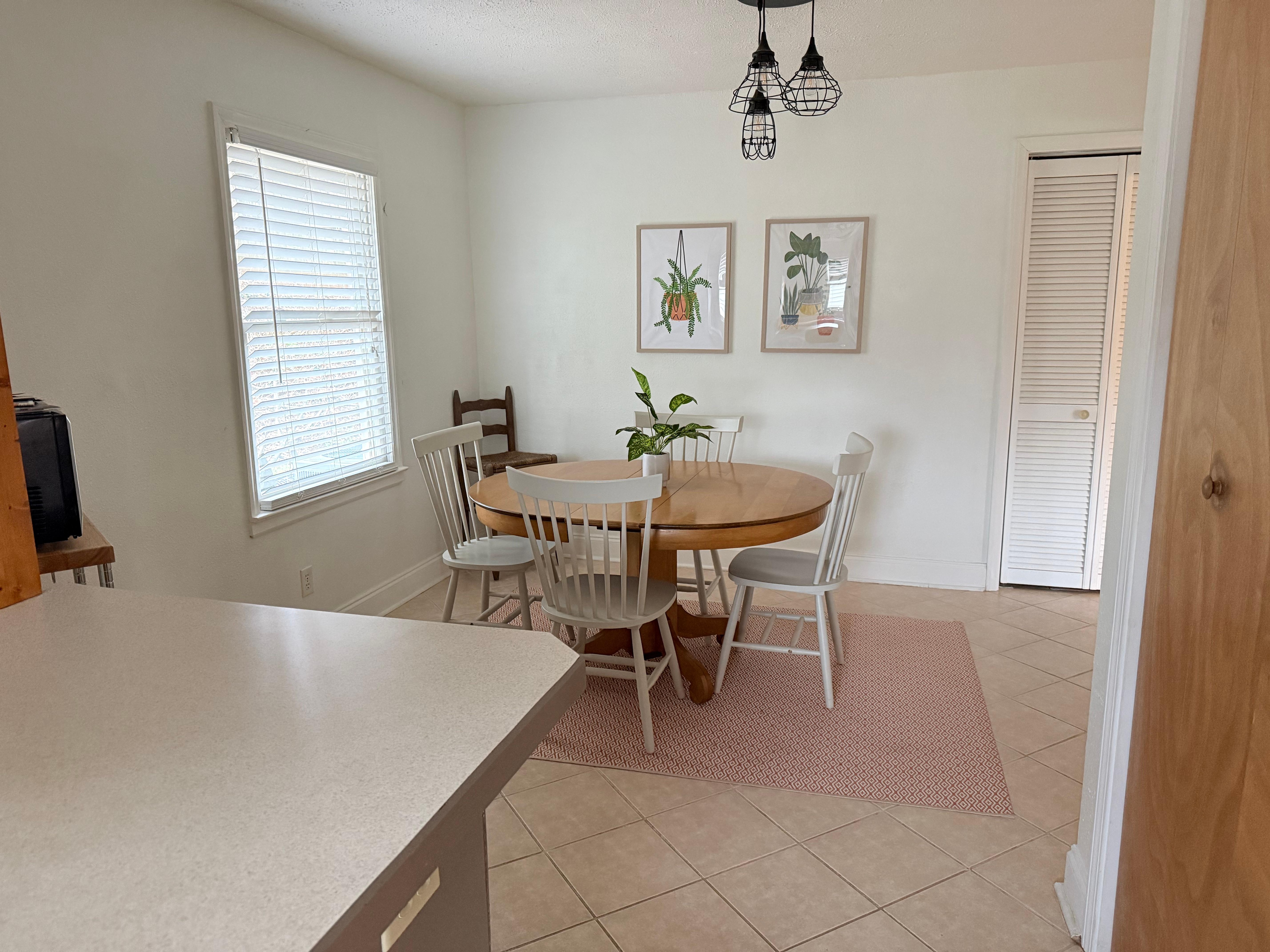 Laundry in the doors to the right, kitchen, dining area also exits toward bedrooms