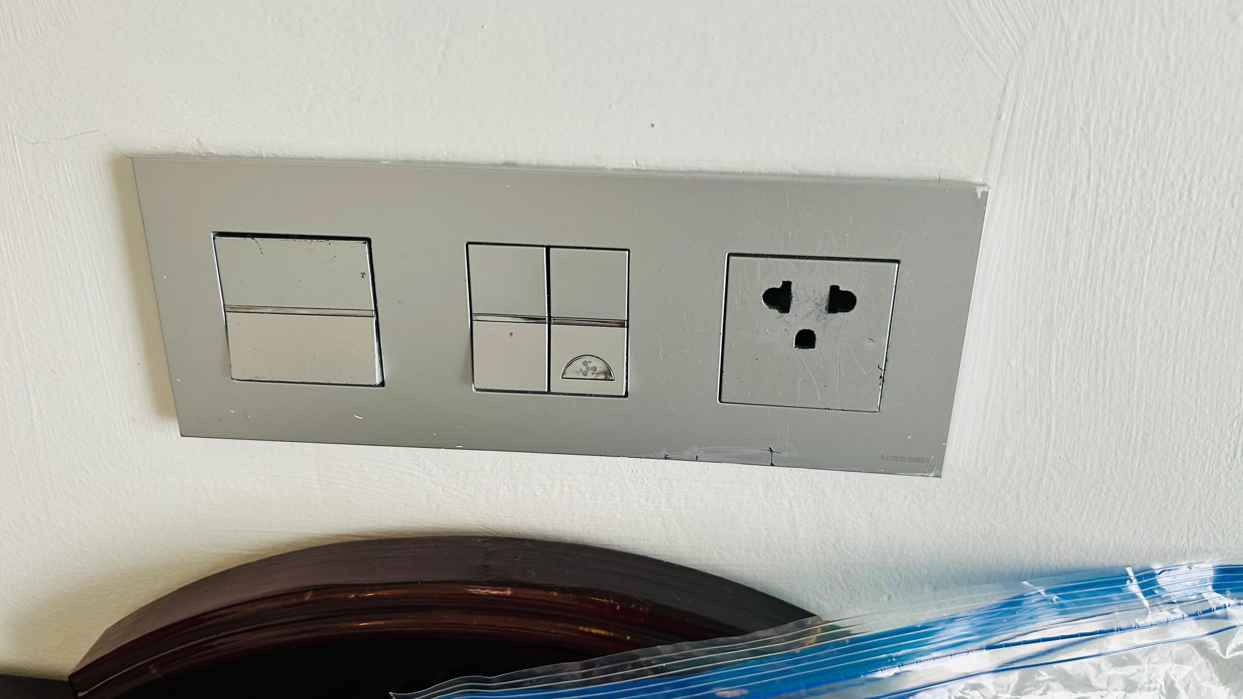 This was the only outlet and I couldn't get a drop cord to use so I had to charge my devices in the bathroom only