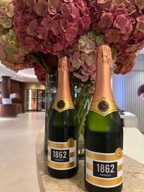 Complimentary sparkling wine thanks to the Hotel and my status on Expedia. The flowers, through the hotel are mostly real and they are stunning!
