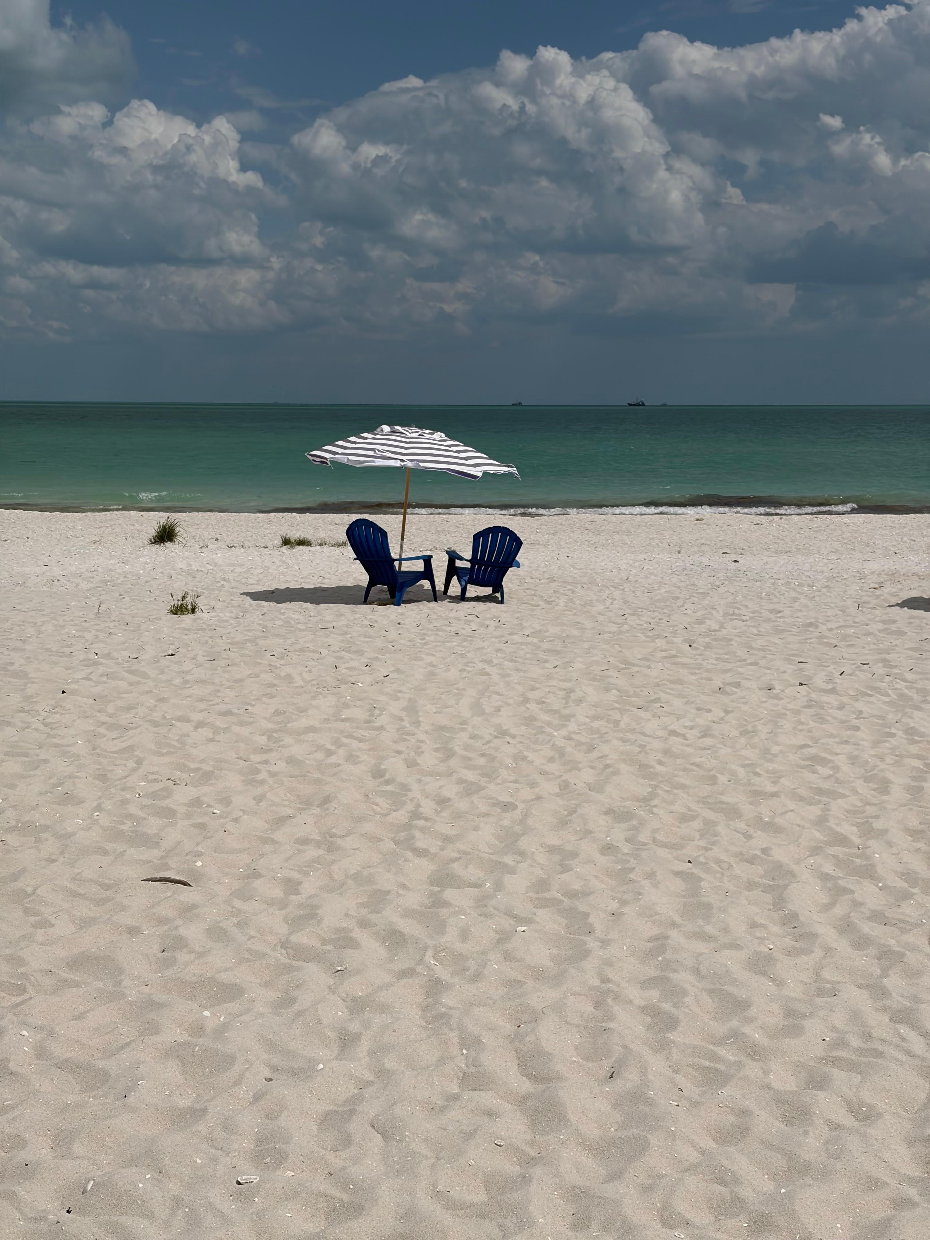 Chairs and umbrella waiting for you