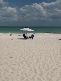 Chairs and umbrella waiting for you