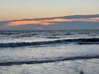 Sunrise off our beach