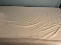 Stains in bedroom.