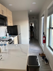 View of the kitchen and the room we chose to use.