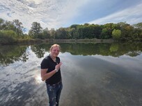 My son on his 27th birthday near the back pond.