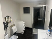 Bathroom, toilet and washing machine.