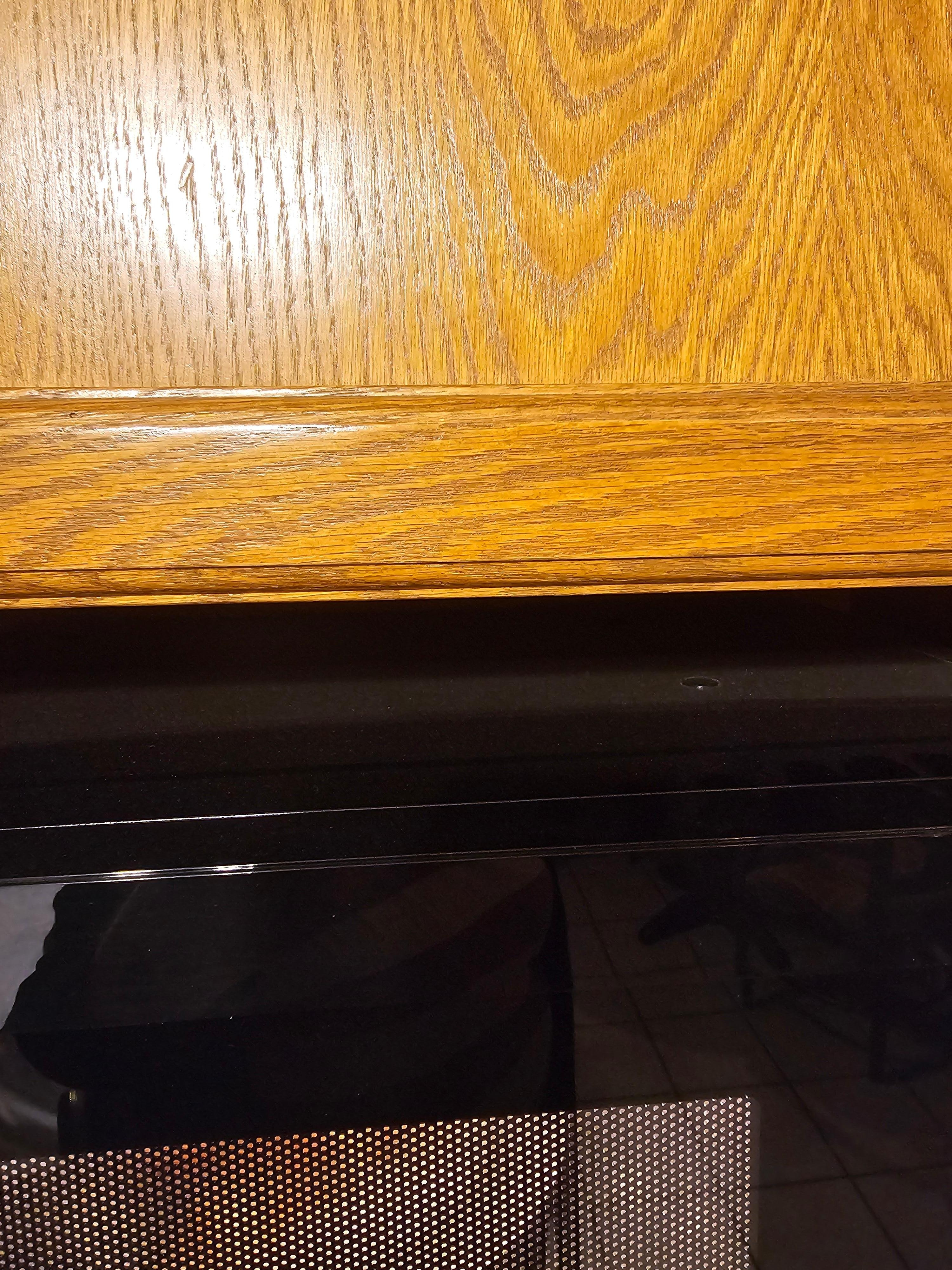 Top of dusty microwave 