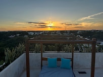 The rooftop area at sunset