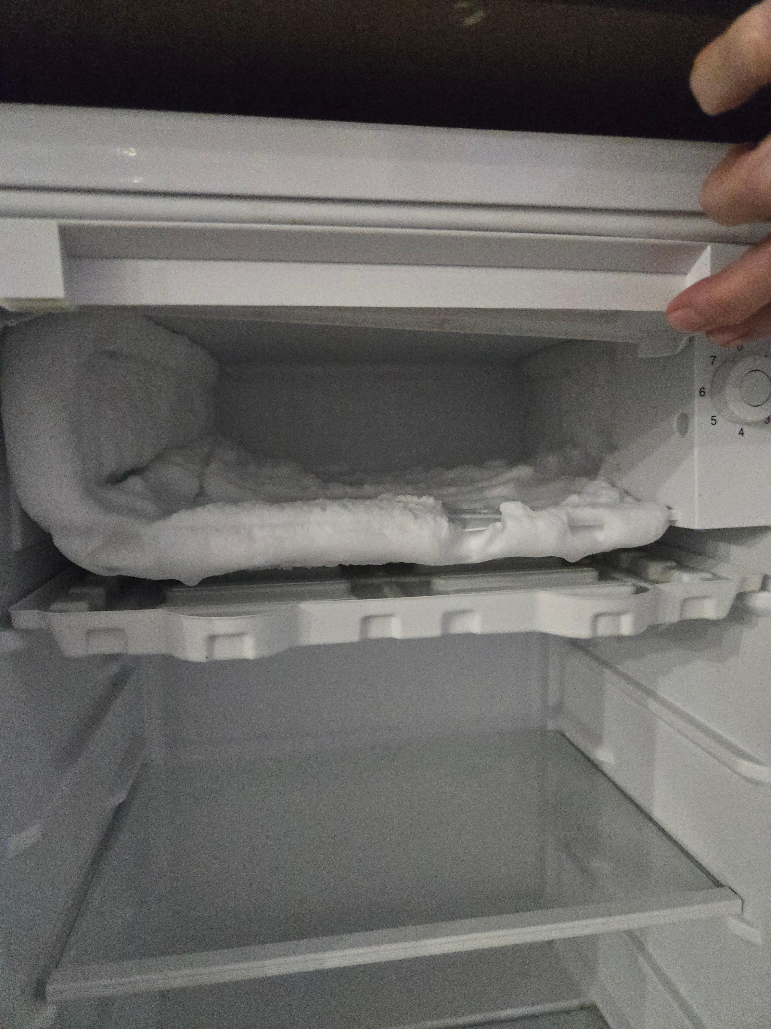 A completely iced freezer compartment of the Refrigerator!