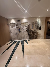 Each floor has painted elevators doors representing a part of the Gothic