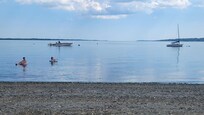 Step down from the deck and out the back, the beach is your backyard!