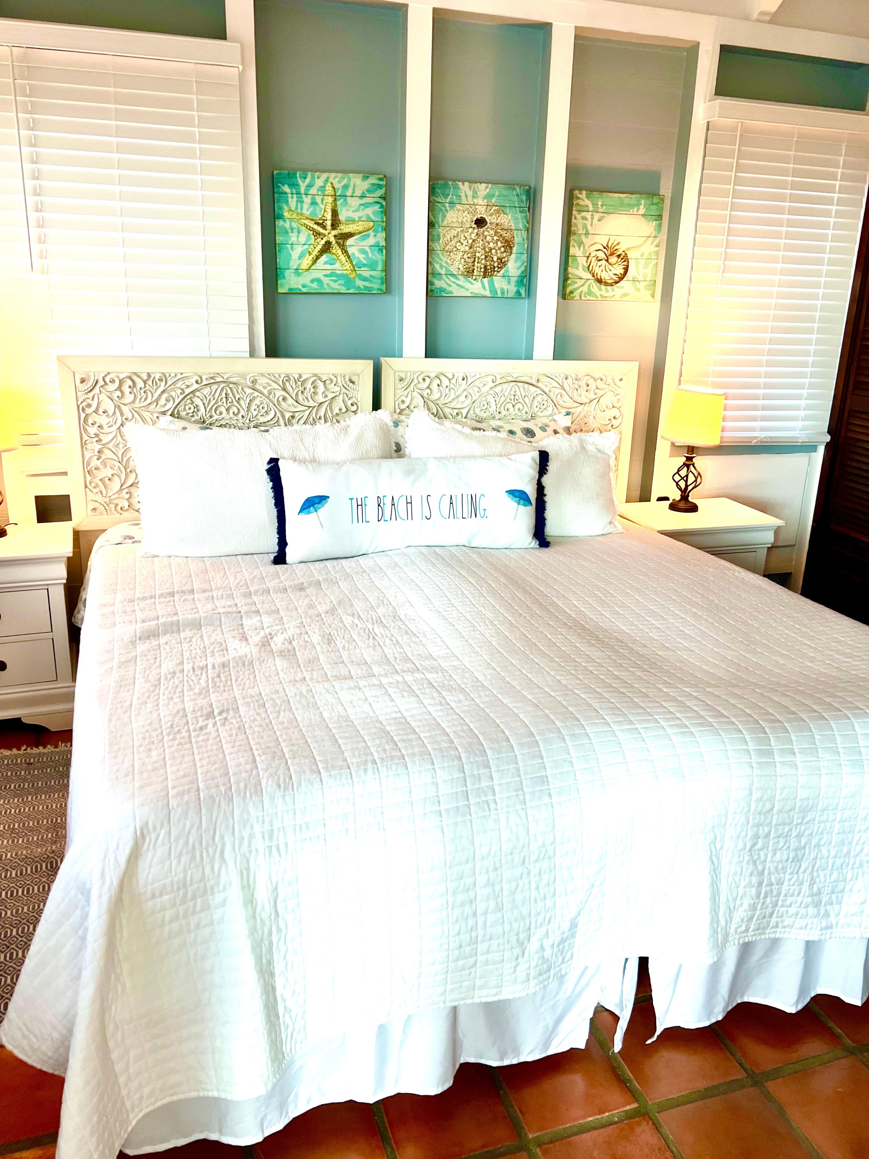 One of the two main floor King bedrooms with outdoor shower (this room can also be set up as two twins). Beds are so comfortable! 