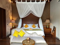 Waking up to the drapery (mosquito netting) all around us was like being in the Arabian Nights.