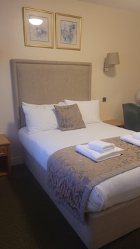 Bedroom with very comfortable bed.
