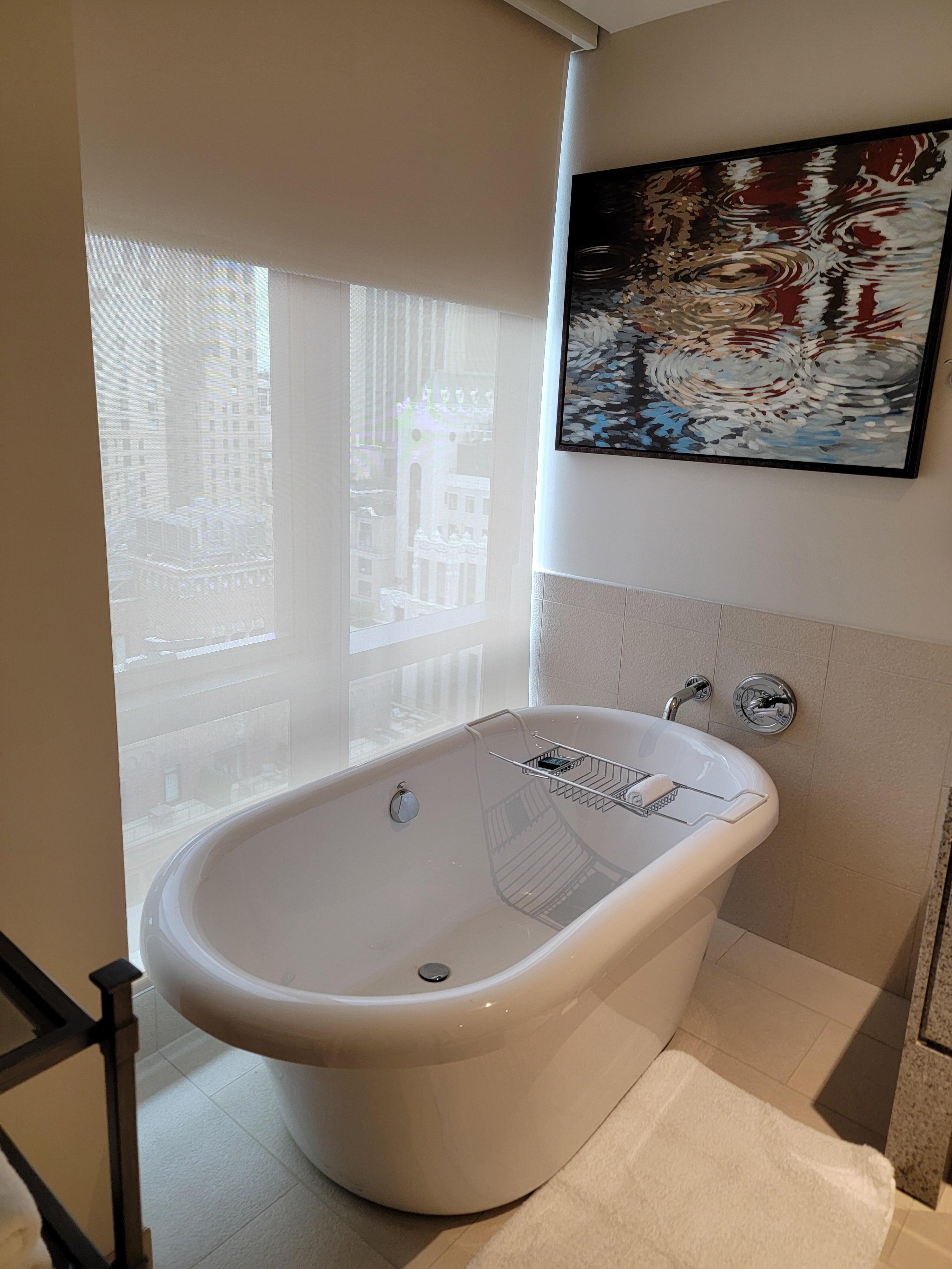 Small bathtub in bathroom
