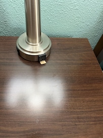 Cereal openly can’t miss it on furniture and floor with candy and chocolate chips all over the floor