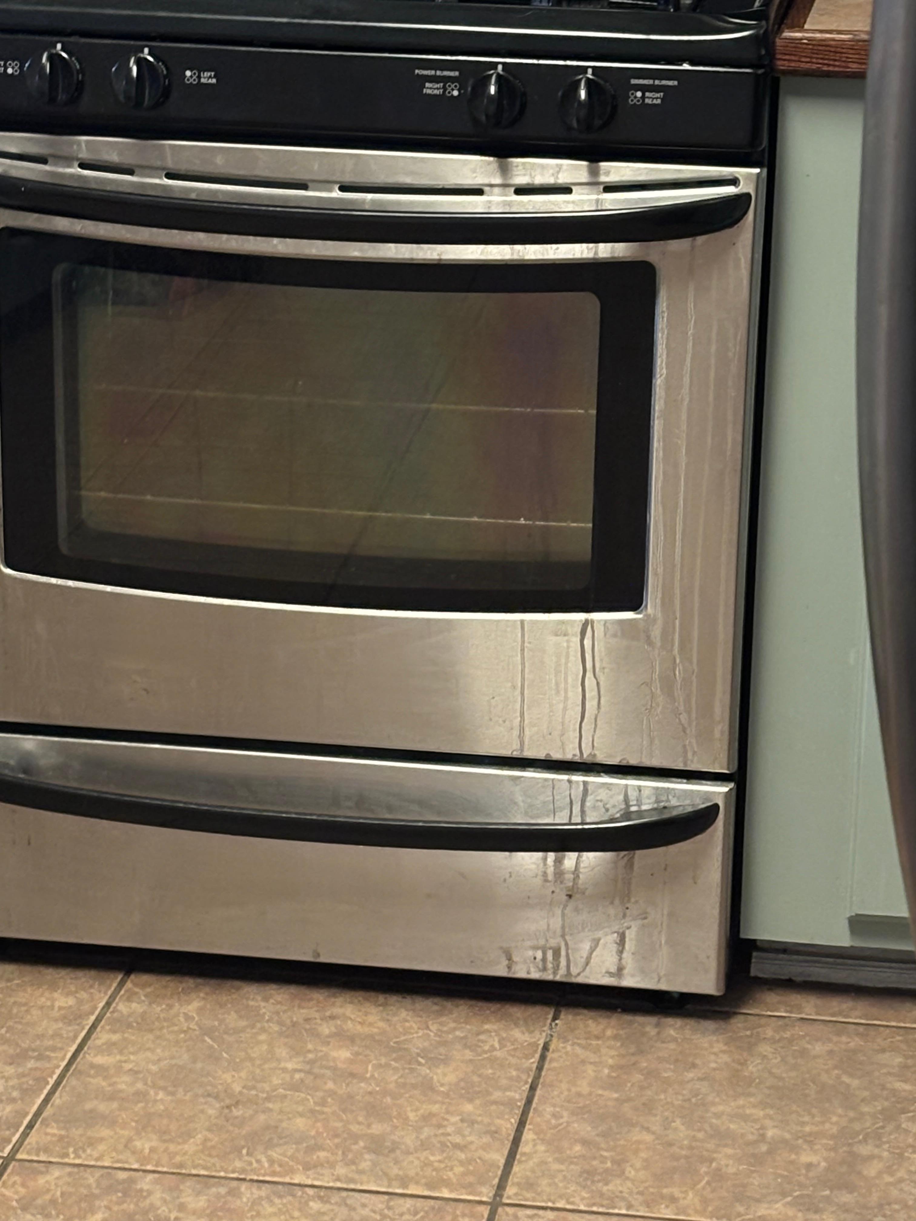 Grease running down the stove.