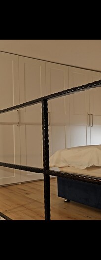 Upstairs bedroom with all the bedding