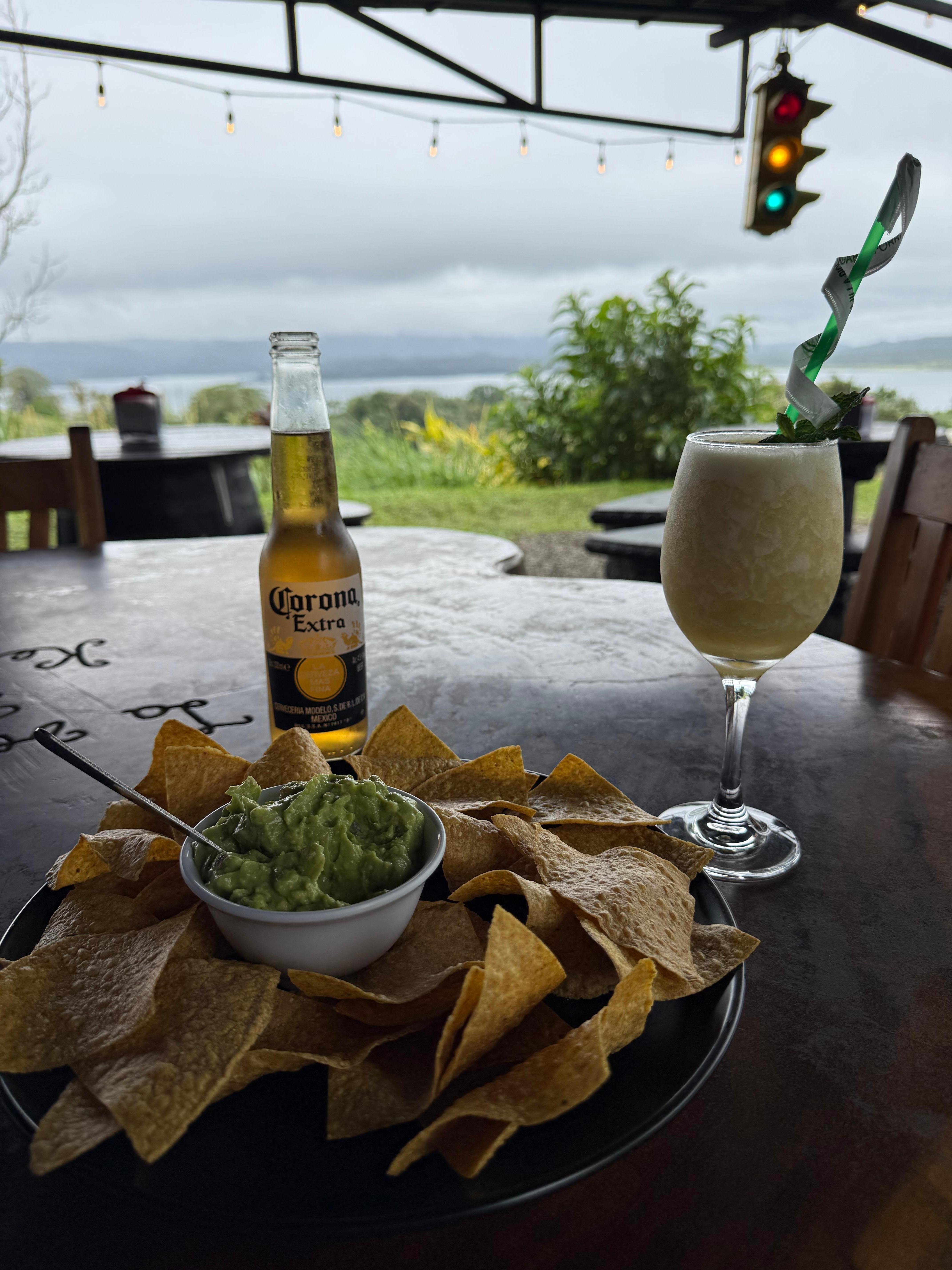 Pina colada and an ice cold beer to go with the most delicious guacamole 