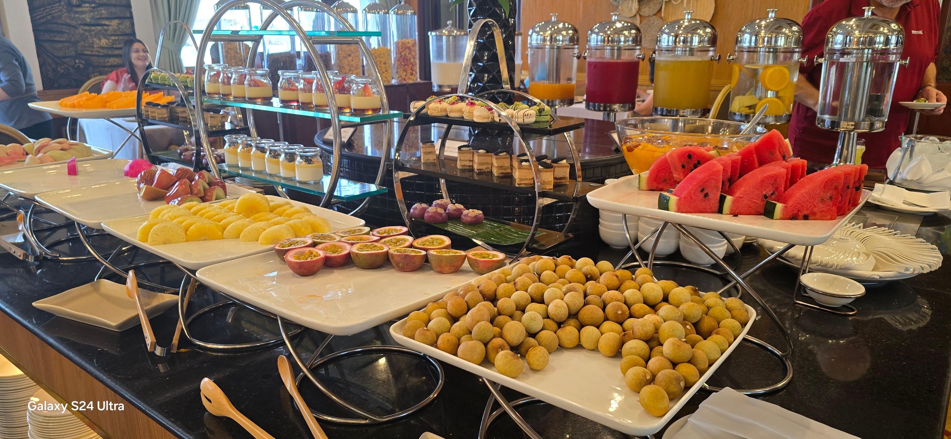 Different fruits in the breakfast buffet.