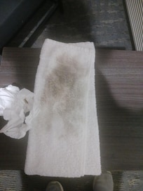 A towel my wife used to clean her feet after walking around the room.